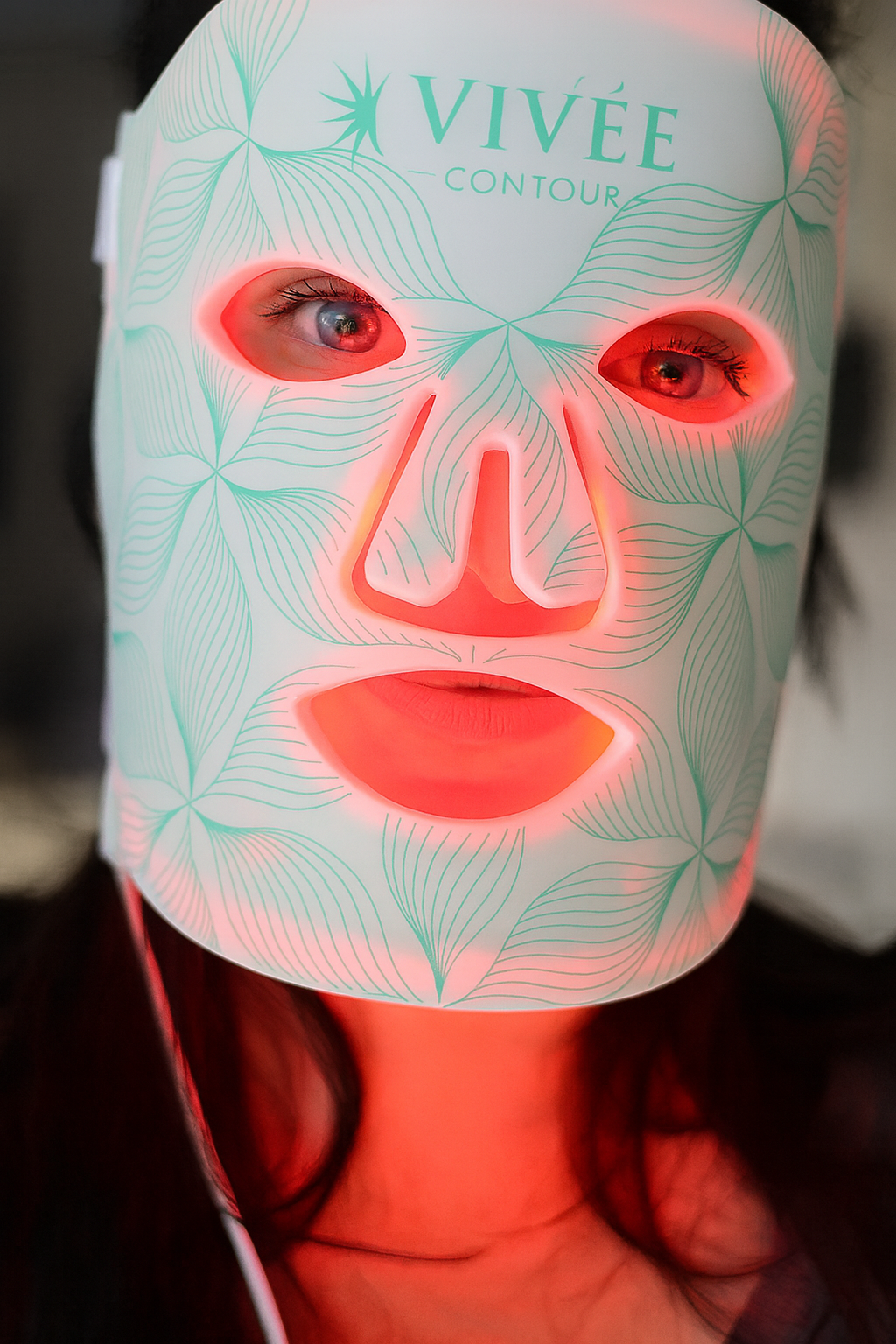 Caitlin showing her nightly Vivee routine for migraine relief